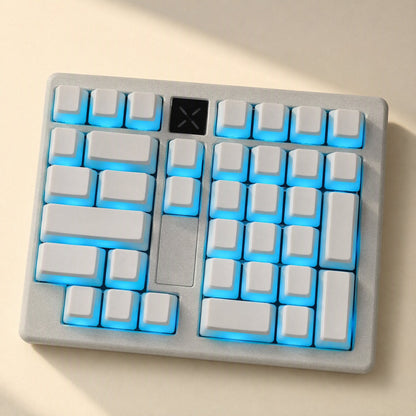 Keyshimmer – White translucent keycaps on a numpad and navigation cluster with blue glow and a black X-logo key