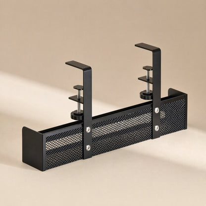 Desktrack – Black mesh wire basket cable rack with two side clamps, shown straight on against a beige background