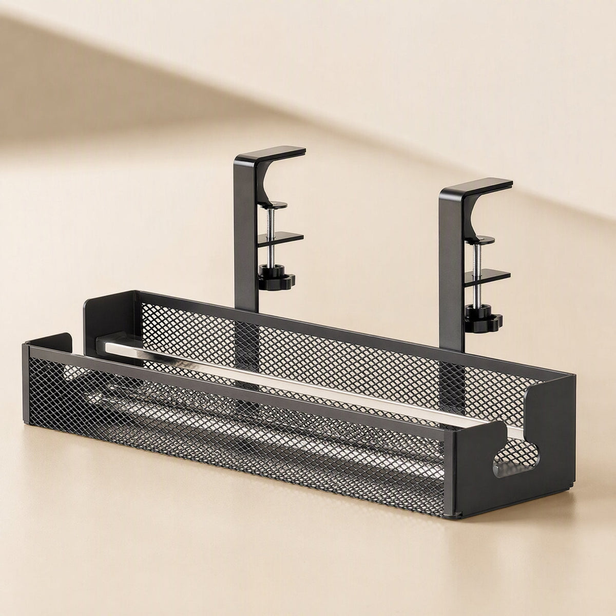 Desktrack – Black wire cable rack showing cable pass-through cutouts on the end panels and clamp arms