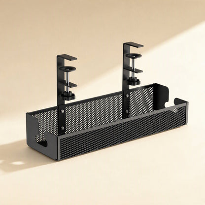 Desktrack – Rear angled view of the black mesh cable organizer with riveted clamp brackets and open cable slots