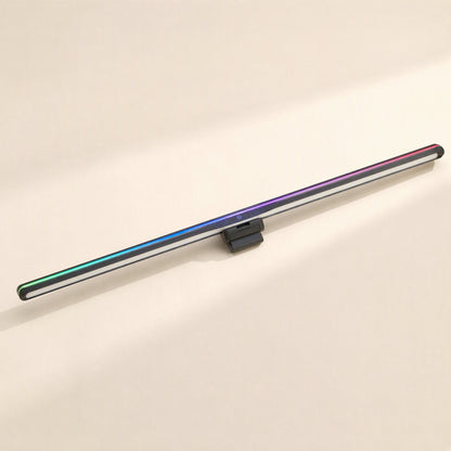 Tapbar – Slim light bar with rainbow RGB backlight glowing in blue, purple and red on a cream background