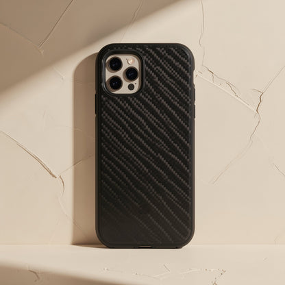 Flipgrain – Close view of black woven carbon-style case texture and camera cutout on a cracked cream plaster backdrop