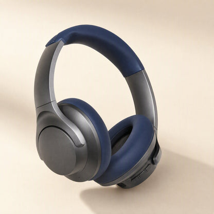 Caseguard Soundcore Q20i silicone headphone case in navy on gray headphones, angled view on beige