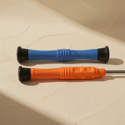 Bitdriver – Blue and orange screwdrivers lying side by side, showing grip ribbing and black end caps