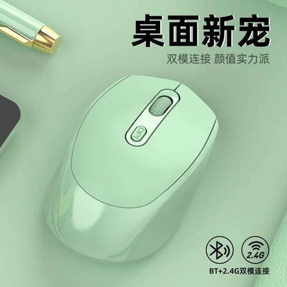 Quietgrip Silent Bluetooth Wireless Mouse in mint green on a matching desk with a pen, Chinese text overhead