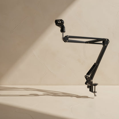 Clipgrip Microphone Bracket With Clip, a black boom arm with clamp, shown in full against a cream wall