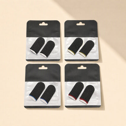 Gamegrip Touchscreen Finger Sleeve – four bagged pairs of black speckled thumb sleeves with white, yellow, blue and red cuffs