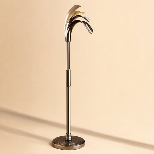 Tallstead – Pull-out alloy pole with curved metallic top section on a ringed round base against a warm beige backdrop