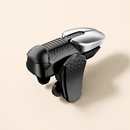 Gameglide – Single black trigger with silver top button and dotted clip, close-up from the side on a cream background