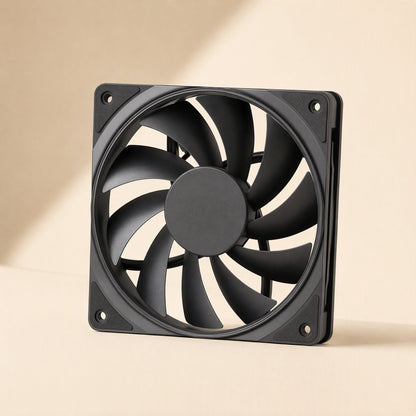 Fanwhisper Desktop Cooling Fan – front view of a black fan with ten curved blades around a round center hub