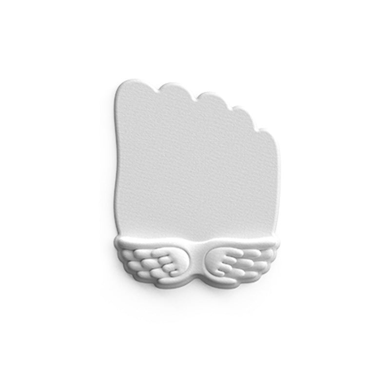 Wingpad – Grey wrist mouse pad with a fist-shaped top and small embossed wings along the bottom edge, on white