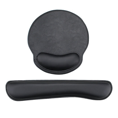 Wristcradle – Black leather round mouse pad with curved wrist rest above a matching long keyboard wrist rest, white