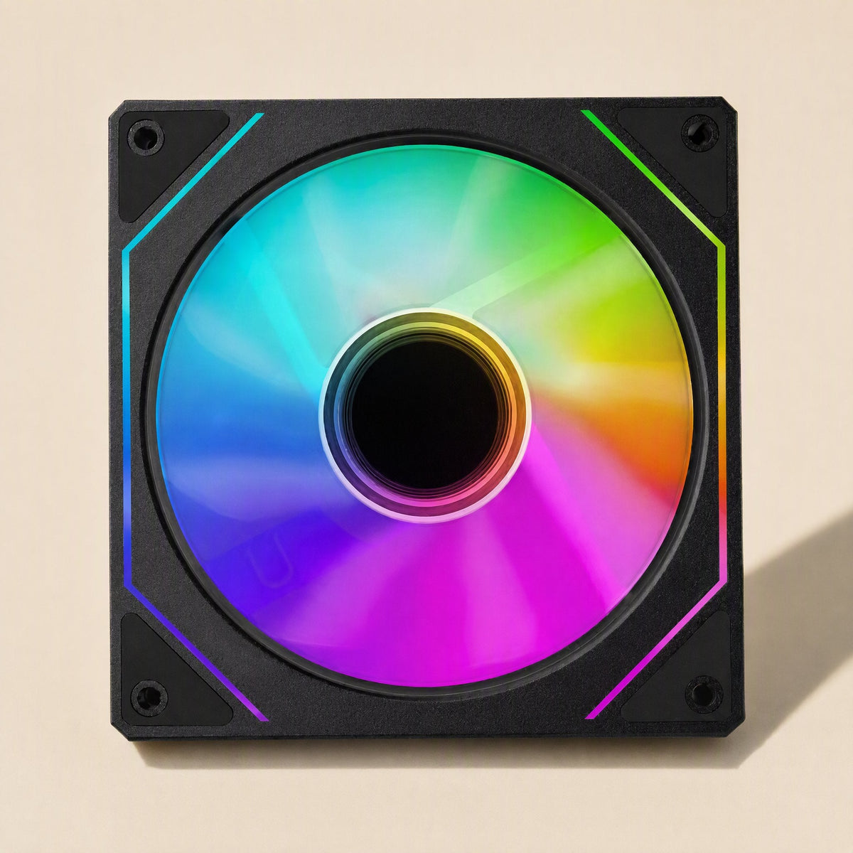 Lightspin – Front view of the black fan with a multicolor blade glow, lit corner edges and a dark center hub