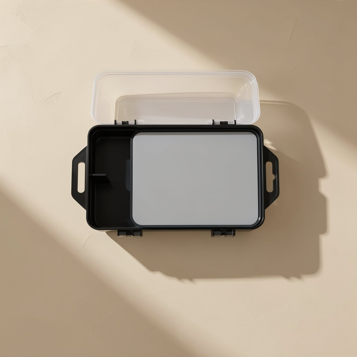 Open black case with clear lid raised, grey foam insert and side handles, from the Bitbundle screwdriver set
