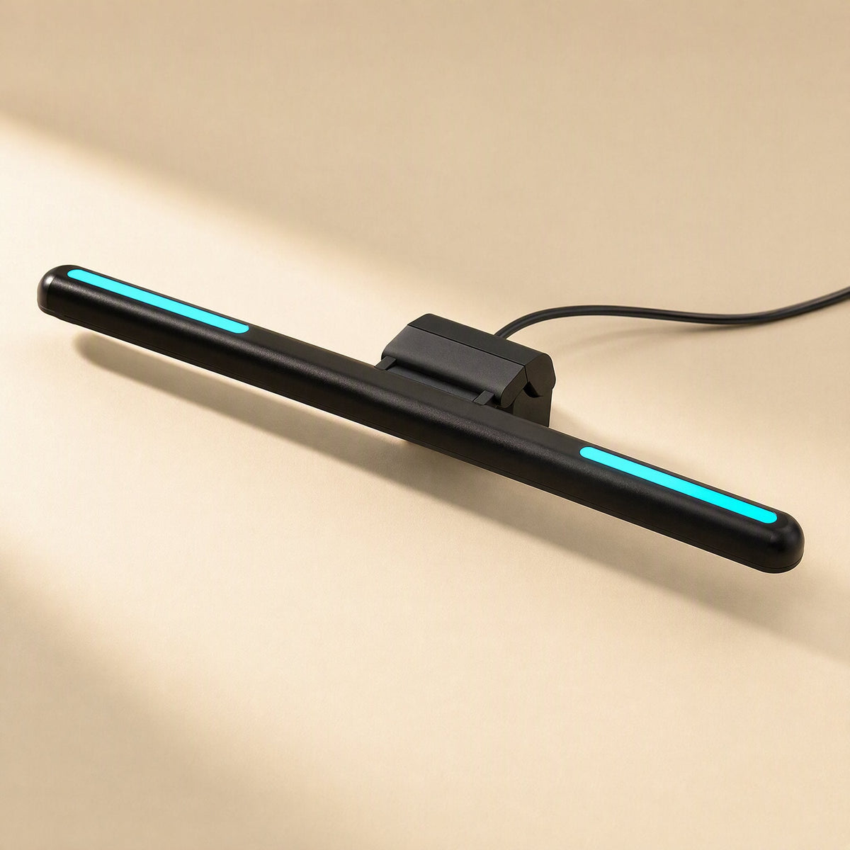 Screenlit USB-Powered Computer Screen Hanging Lamp with cyan light strips and a black cable on a beige surface