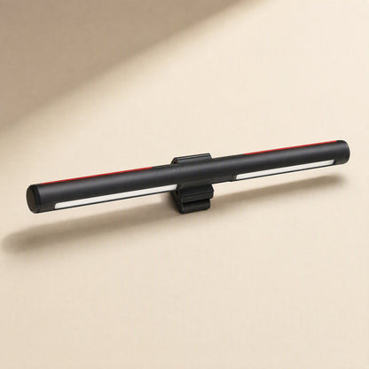 Screenlit – Black lamp bar clipped at its centre, with white light strips along the underside and a red edge glow