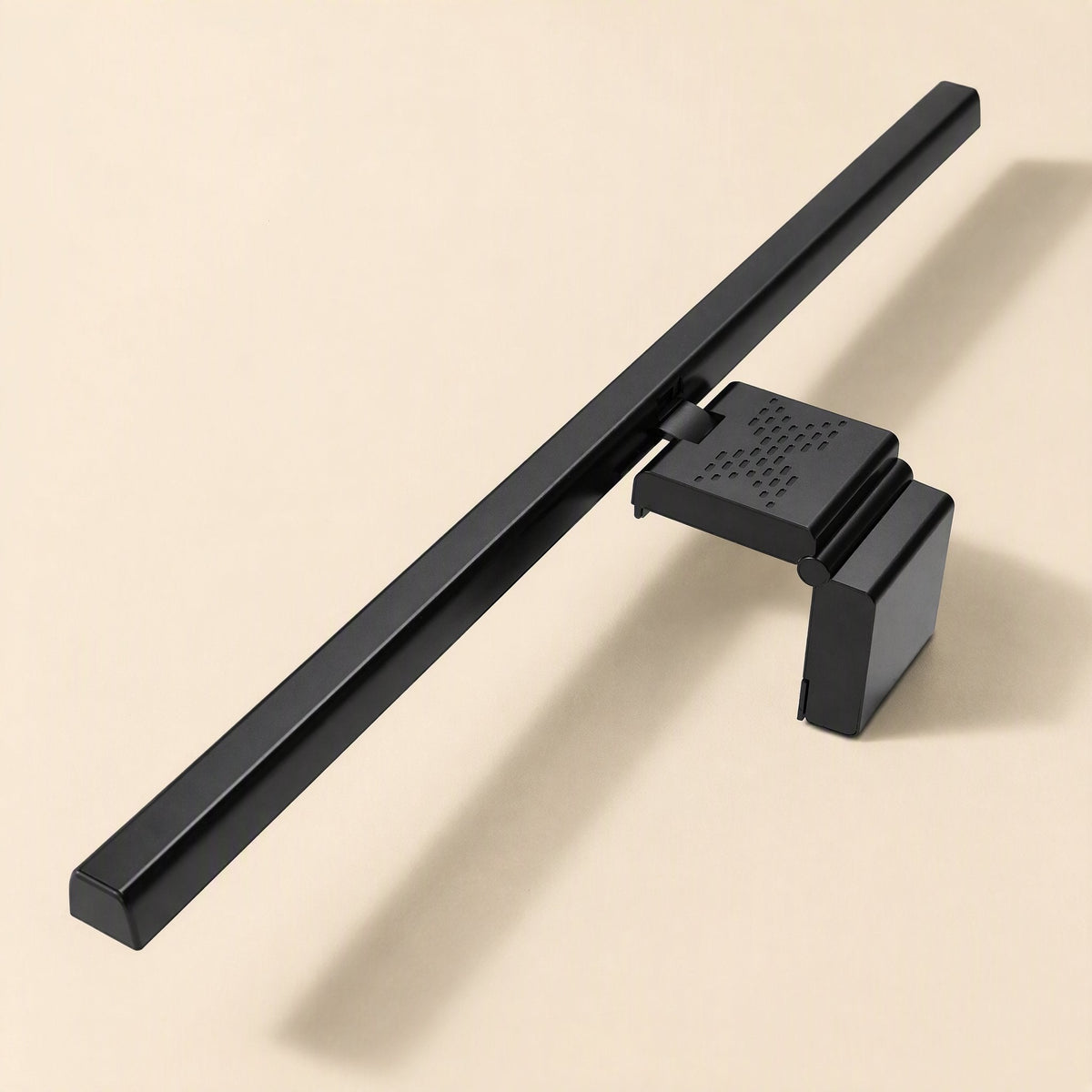 Screenglow – Black lamp bar on its folding clip mount, shown unlit from the side against a cream background