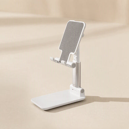 Phonehinge – White folding phone stand extended at an angle on a beige background with a soft shadow