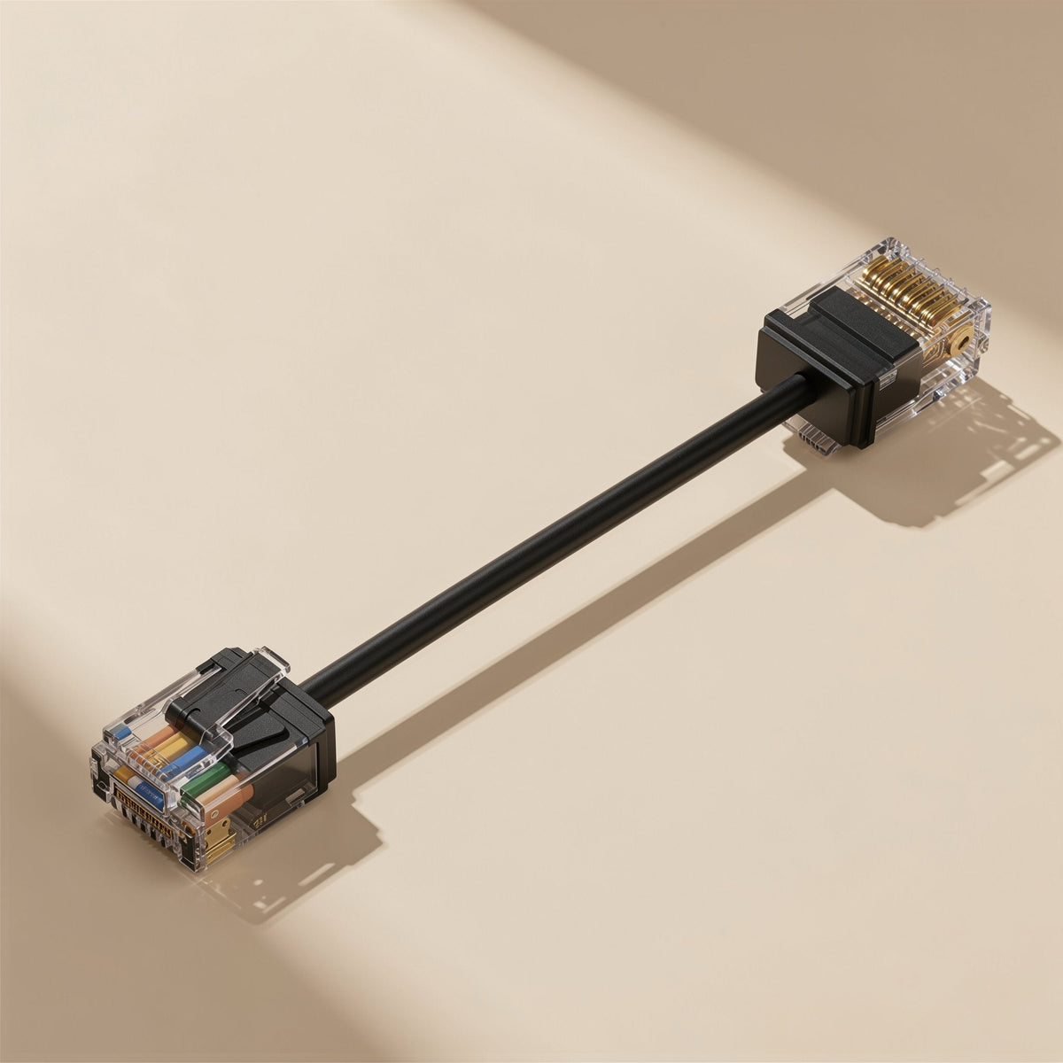 Copperpath Pure Copper Cat6e thin RJ-45 cable in black, shown at an angle on a beige surface