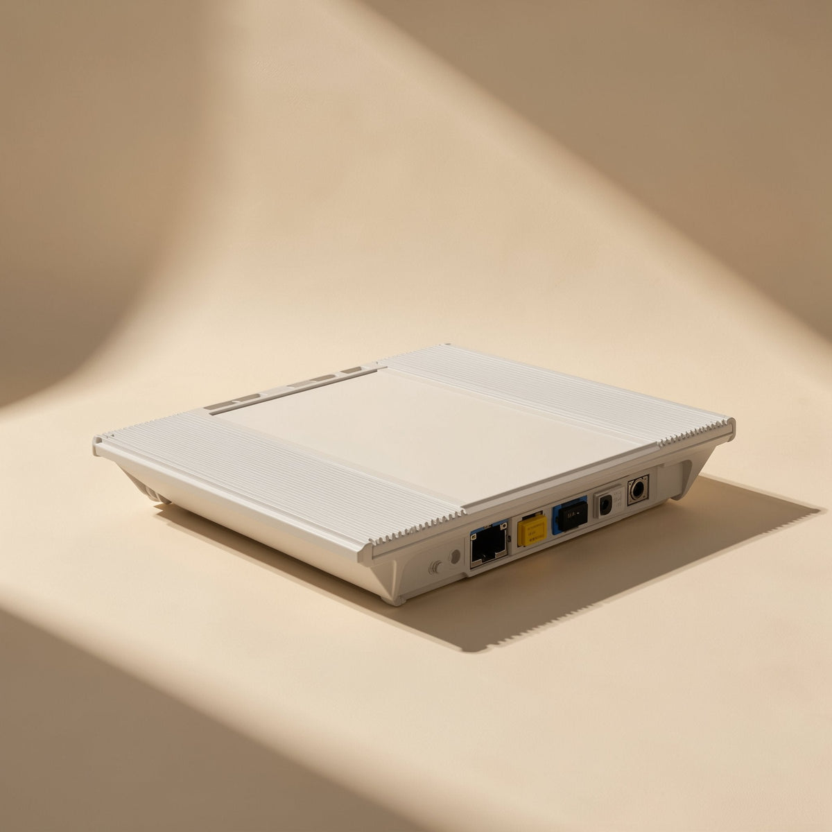Copperpath – White router seen from the side, with Ethernet and other ports on the back panel