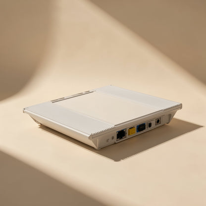 Copperpath – White router seen from the side, with Ethernet and other ports on the back panel