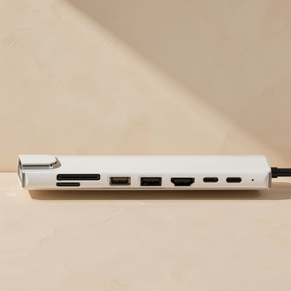 Docknest USB-C Docking Station Hub – side view of a white hub showing card slots, USB-A ports, HDMI port and two USB-C ports