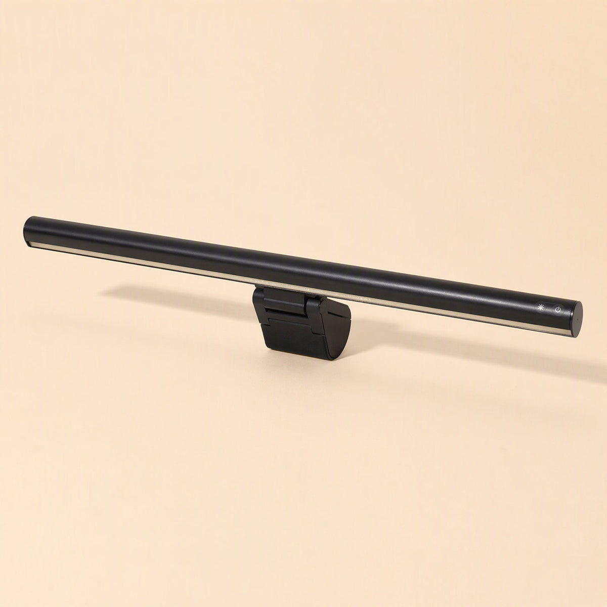 Alulight – Black light bar with a small button on the end cap, resting on its clip, three-quarter view