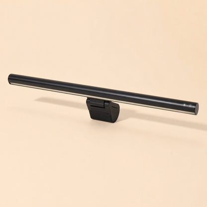 Alulight – Black light bar with a small button on the end cap, resting on its clip, three-quarter view