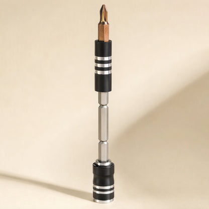 Magnetwist – Extension rod with magnetic bit holder and a copper Phillips bit standing upright against a cream backdrop