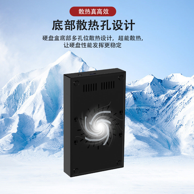 Shellbox – Underside of the black enclosure showing ventilation slots and screw holes over a snowy mountain backdrop