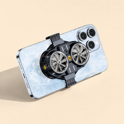 Coolcove – Phone with frost-pattern back and the radiator clamped on, two fans and a gold center button visible