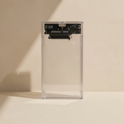 Diskden 2.5-Inch Hard Disk Enclosure, clear case standing upright, circuit board and SATA connector at top