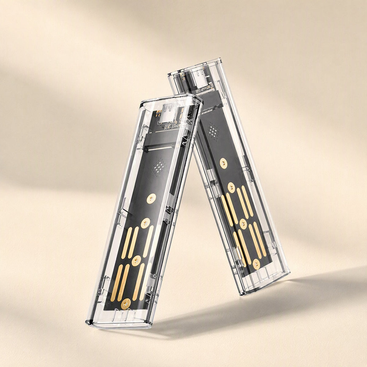 Driveclear – Two clear enclosures leaning against each other, showing the circuit board and gold contacts inside