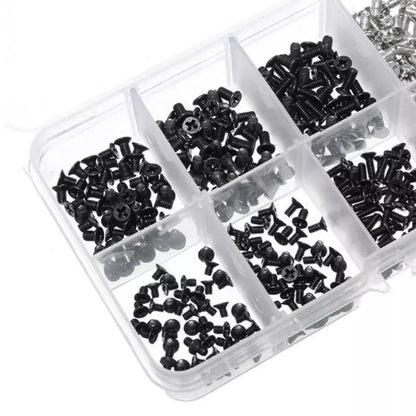 Fixgrove – Close-up of open organizer compartments filled with black flat-head Phillips screws and silver screws