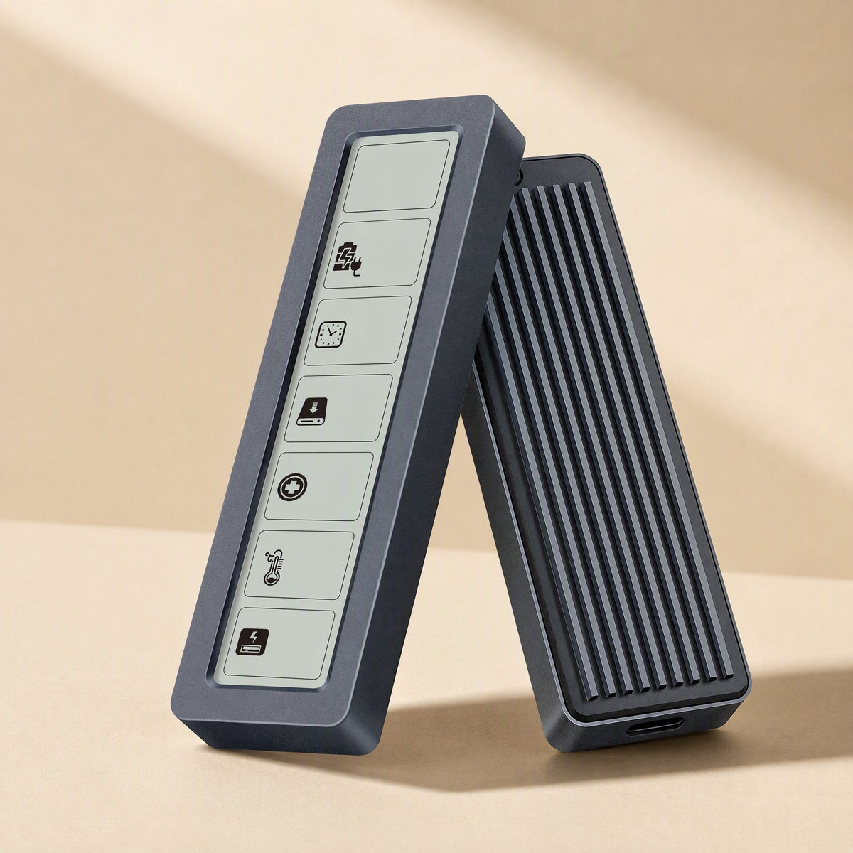 Glowvault Digital Display NVMe Hard Disk Enclosure, display panel with icons leaning against a ribbed back