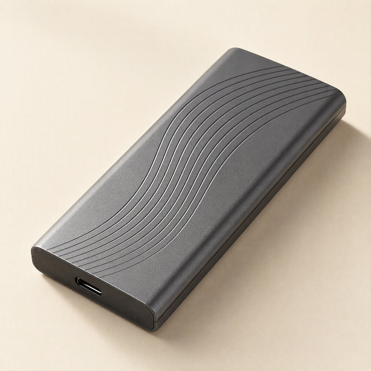 Glowvault – Back of the gray enclosure with wavy line pattern and USB-C port at one end