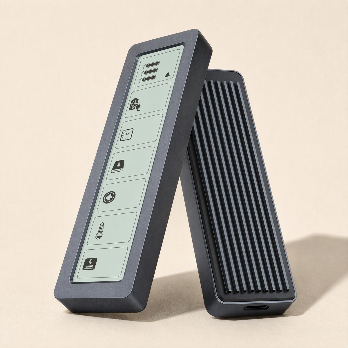 Glowvault – Front view of display panel with battery bars and icons, next to the ribbed rear casing