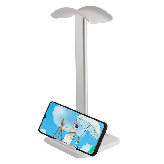 White Alumount Headphone Stand with silver aluminum pole, a smartphone resting in its base slot, on white background