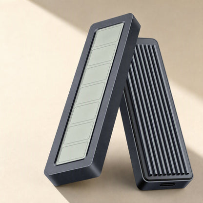 Chillscope M.2 SSD Enclosure With Screen Display, two gray units standing, one showing a segmented panel