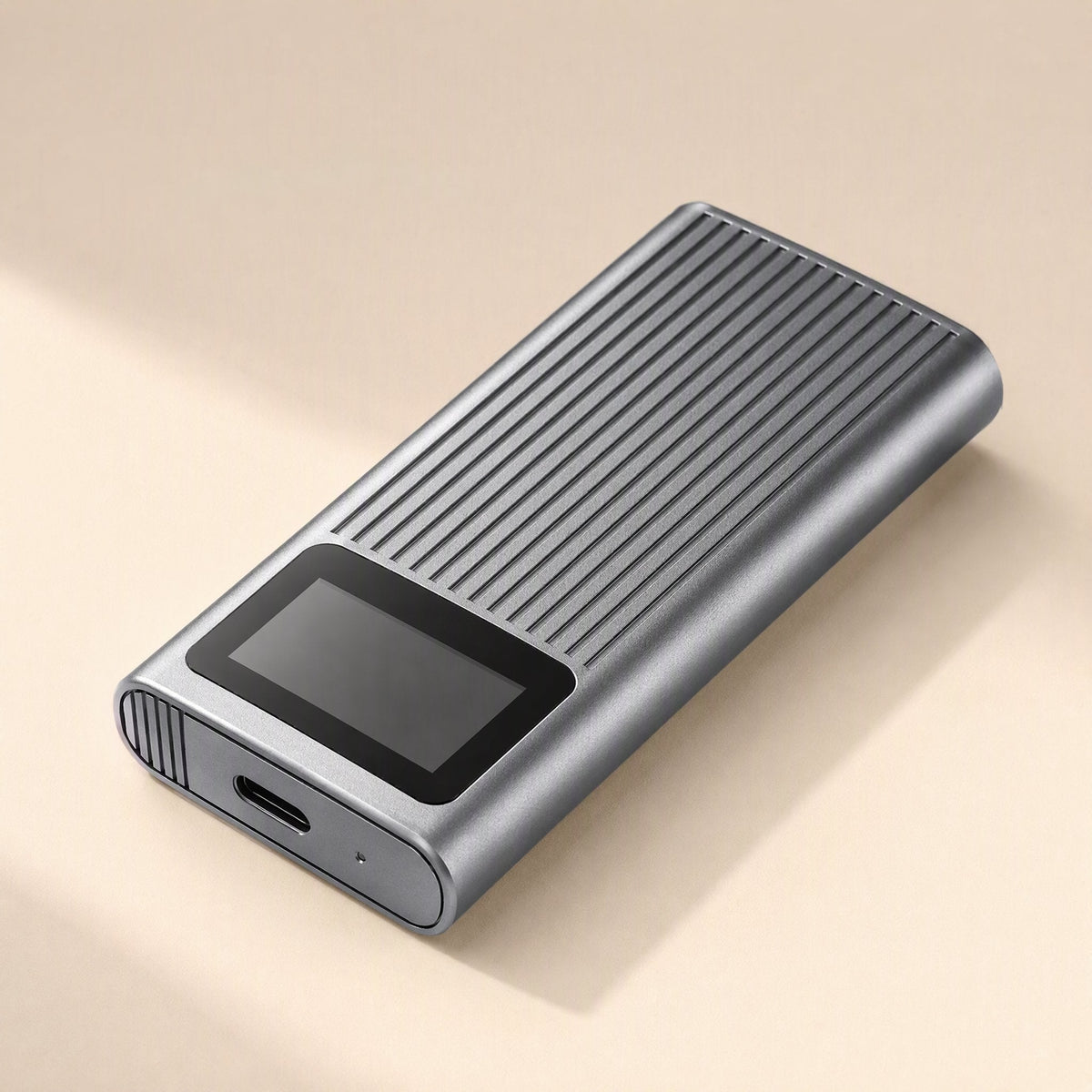 Chillscope – Gray ribbed enclosure at an angle, small screen display and USB-C port on the end