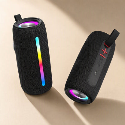 Twinbeat RGB Bluetooth Speaker pair in black, one upright with a glowing rainbow light strip, one lying on its side