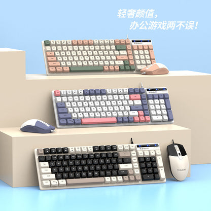 Typeflow – Three keyboard and mouse sets in green-peach, purple-pink and black-cream stacked on tiered steps