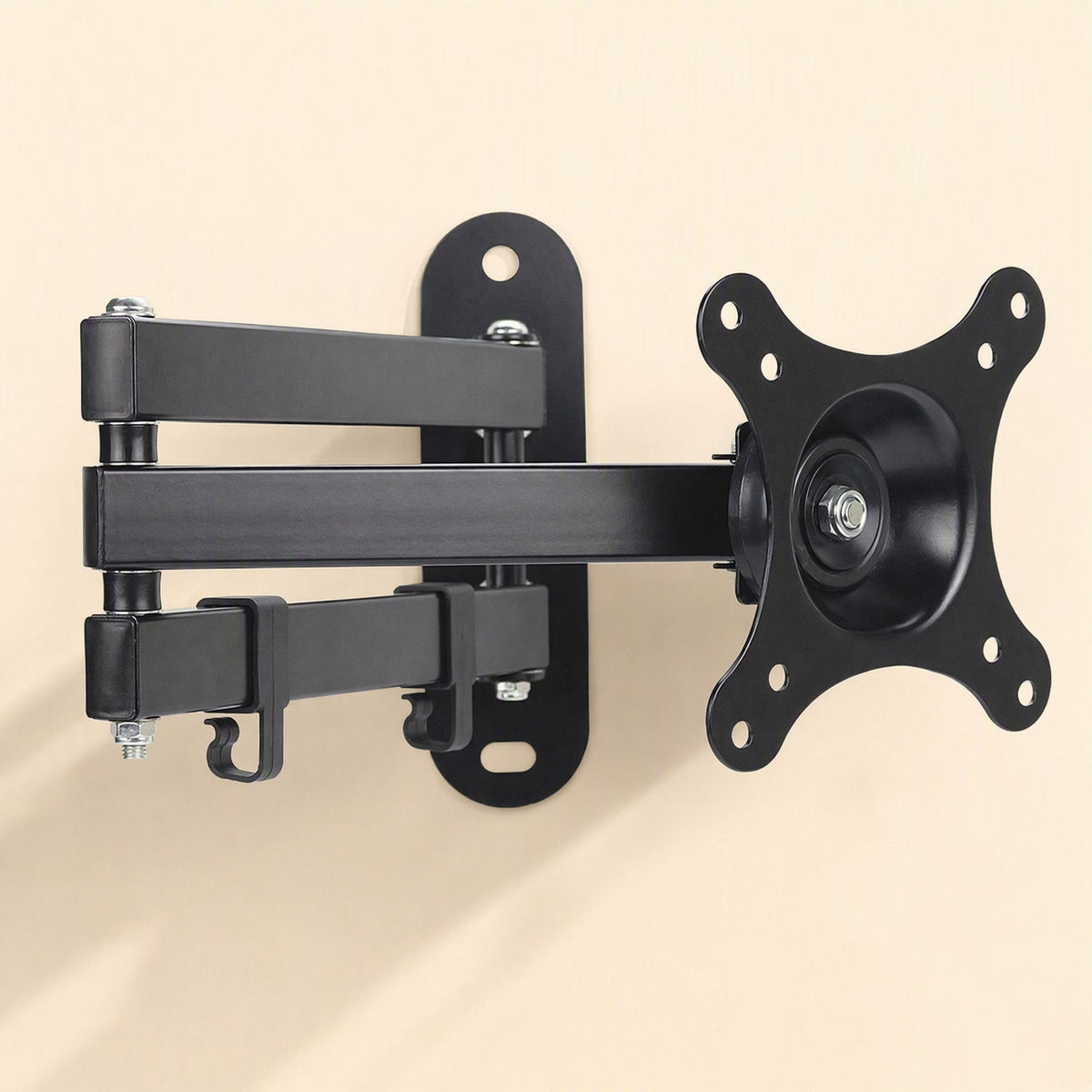 Reachmount Telescopic Monitor Wall Mount in black steel, mounted on a beige wall with arms extended