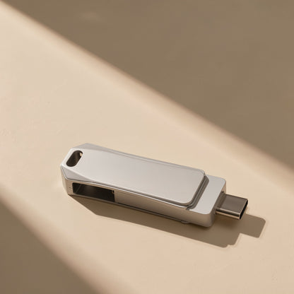 Typeflash – Silver metal swivel drive with its USB-C connector extended, shown from the side with a keyring hole