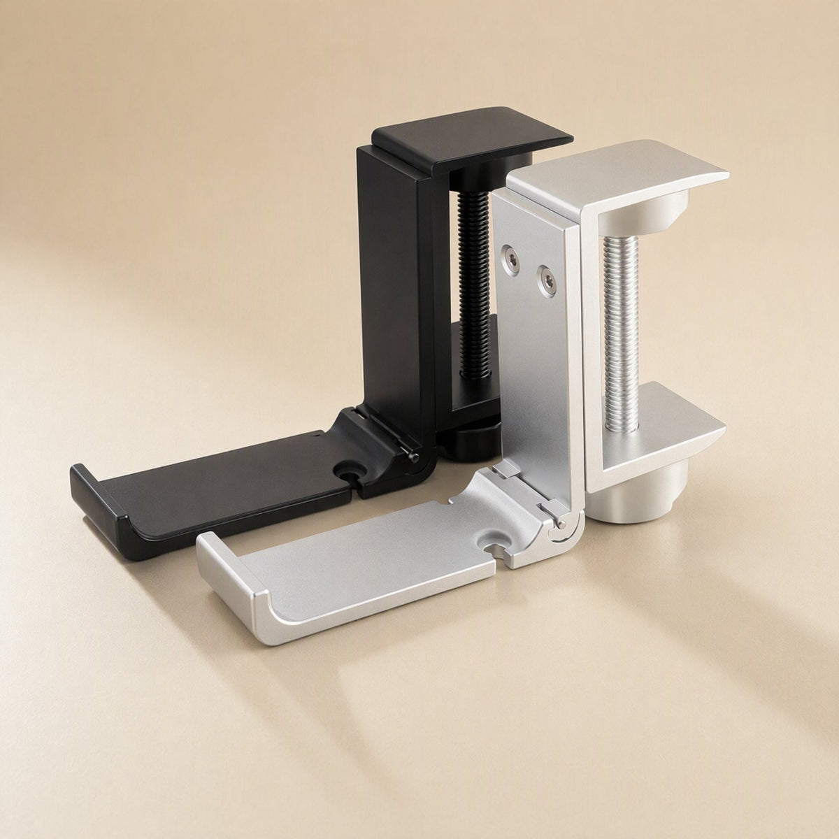 Alloyperch Aluminum Alloy Headphone Stand – black and silver headphone stands side by side with cradle arms folded out flat