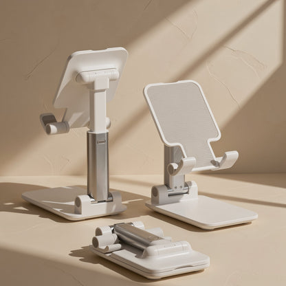 Foldprop ABS Foldable Phone Stand in white shown extended, upright and folded flat on a beige surface
