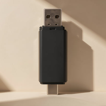 Readlink – Black reader standing upright, USB-A plug at the top and USB-C connector at the bottom, against a beige wall