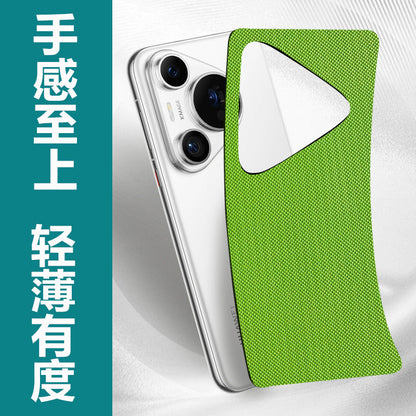 Matteglow – Green textured film peeling back from a white phone with a triangular camera module