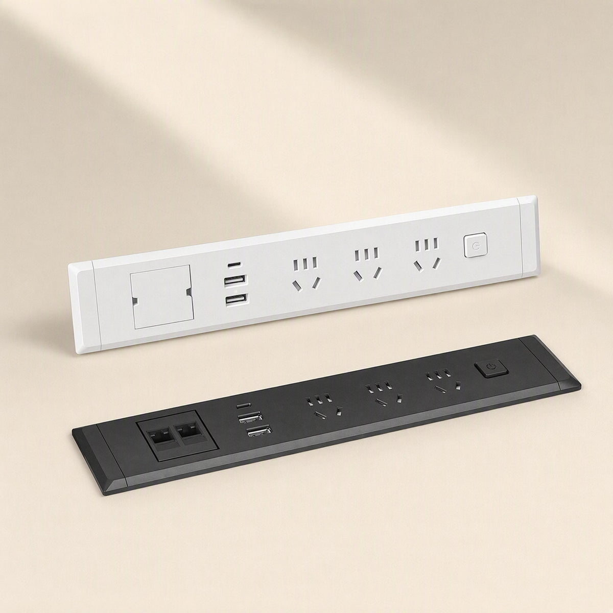 Desknest Embedded Desktop Socket in white and black, each with three outlets, two USB ports and a power switch
