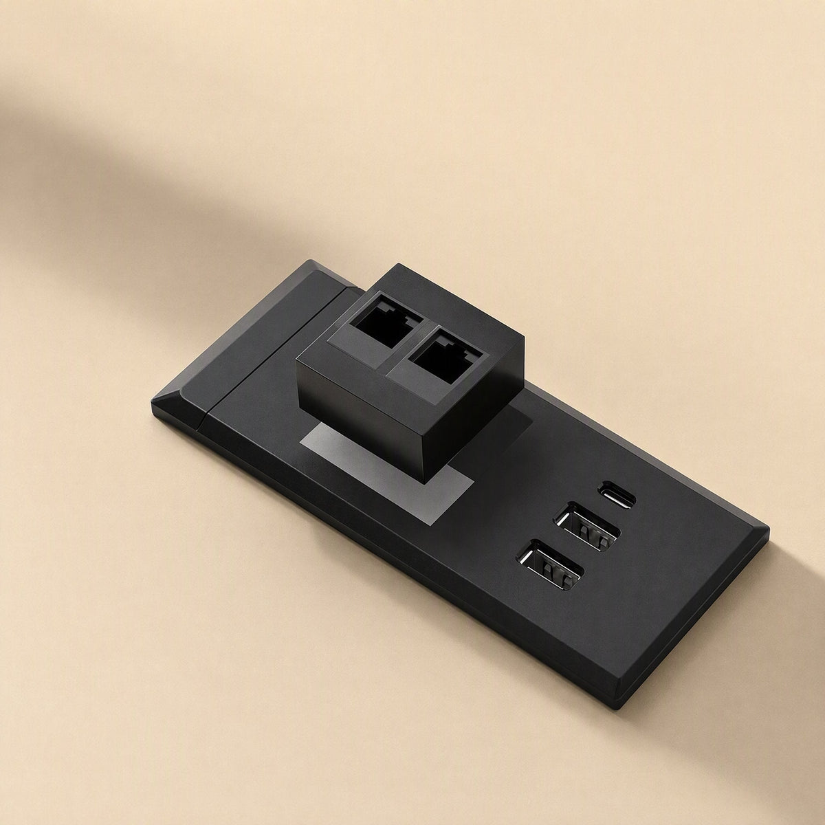 Desknest – Close-up of the black module with two network ports raised above the USB-C and USB-A ports
